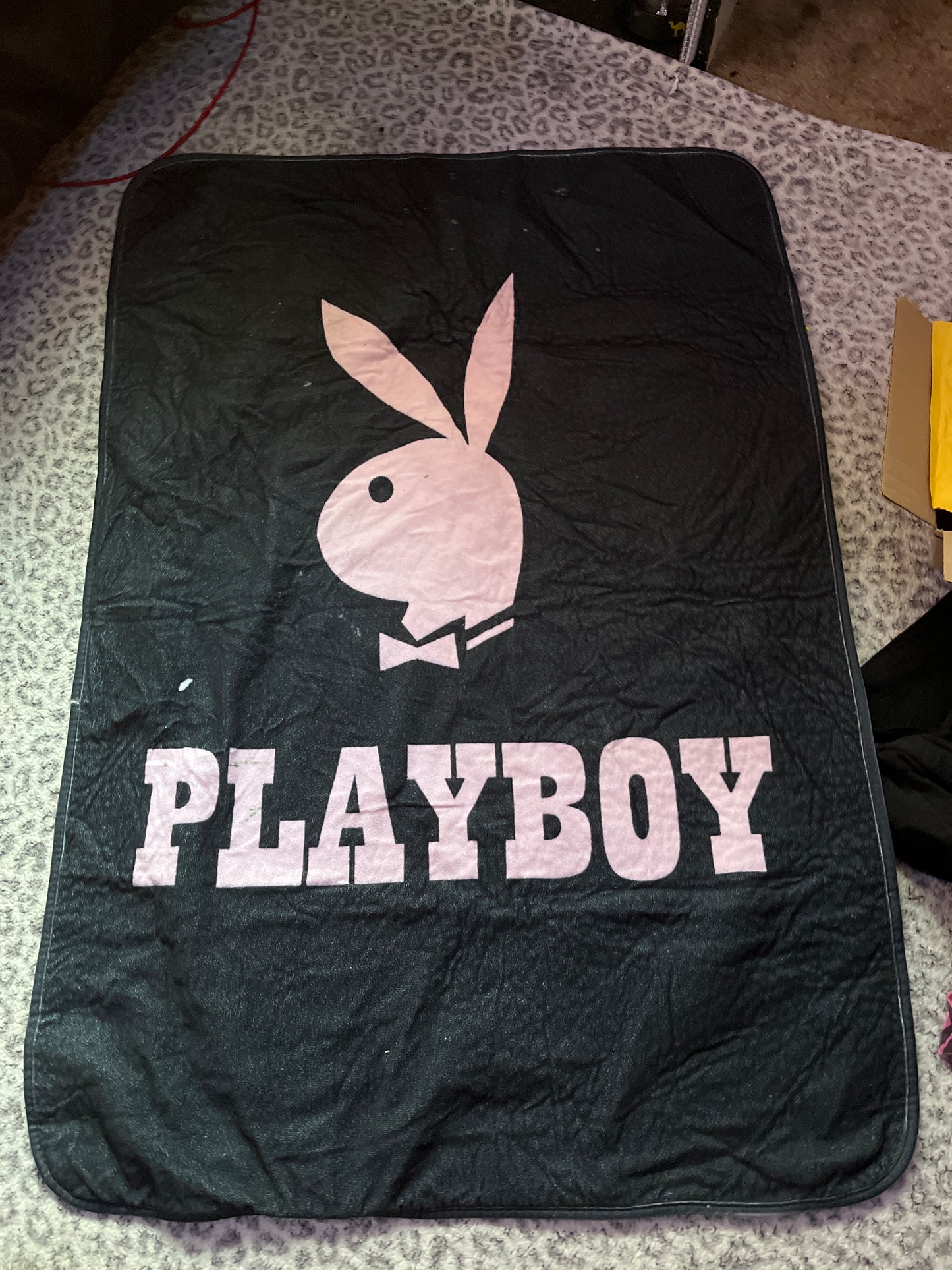 Black and baby pink playboy rug